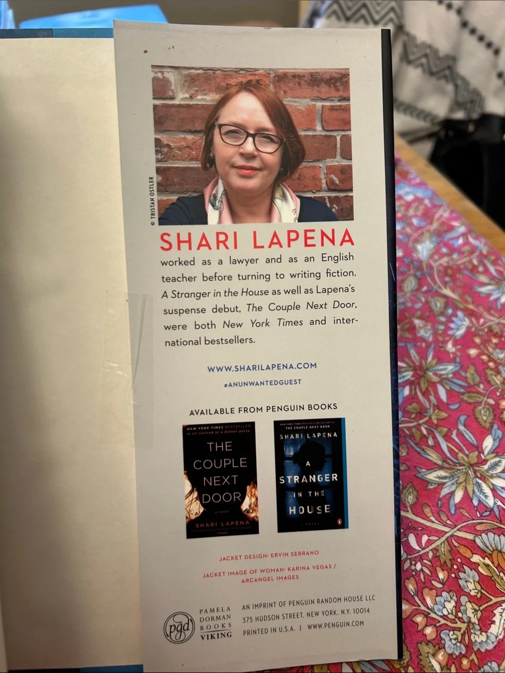 An Unwanted Guest by Shari Lapena Blue Hardcover Novel